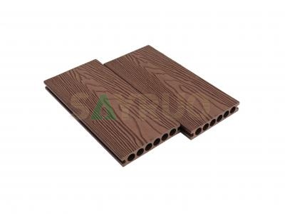 Proyectos ecológicos para exteriores: tarima exterior de madera compuesta de plástico y madera con relieve profundo en 3D y orificios circulares.